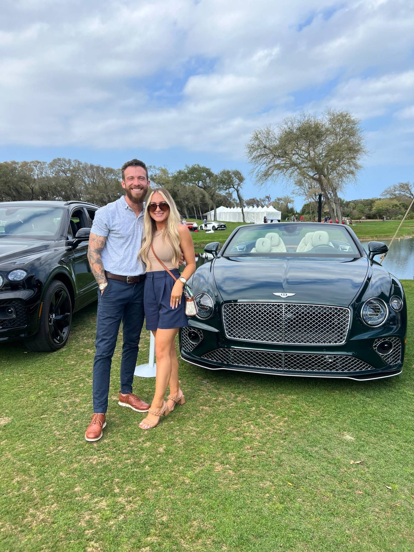 Joshua and Mallory Nalven with a Bentley Continental GT